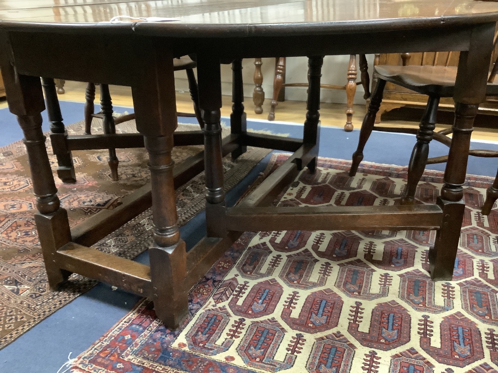 A late 17th century oak oval topped gateleg table